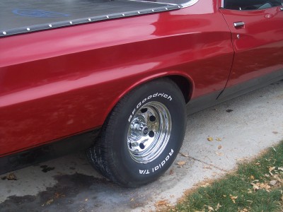 1972 Ford Ranchero - This red 1972 Ford Ranchero features a black tonneau cover and BFGoodrich Radial T/A tires.