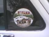 1986 Ford Bronco - A sticker on a vehicle window displays an off-road vehicle graphic.