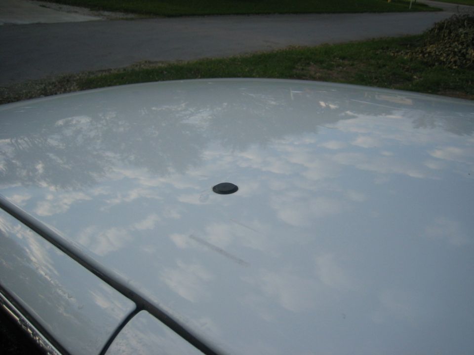 Plug from light bar im assuming. (only one on the car)