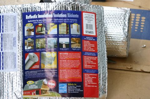 1994 Ford Bronco - A package of Reflectix reflective bubble insulation (model ST16025, 16" x 25' staple tabbed) with a product label showing various installat…