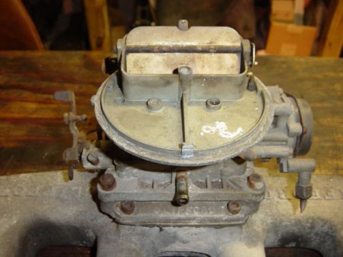 1991 Ford Bronco - This is a close-up view of a Holley carburetor, a common engine component for older vehicles.