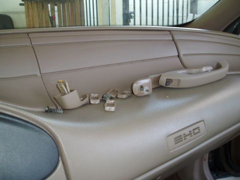 1995 Ford Taurus - Interior door handle and trim pieces removed from a 1995 Ford Taurus SHO.