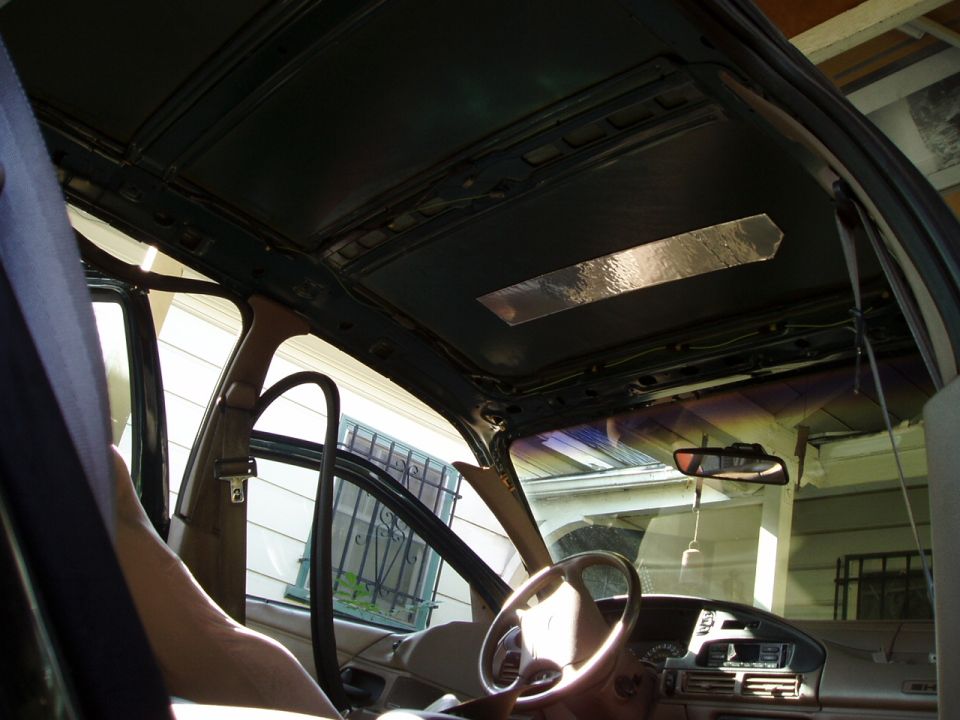Interior headliner with insulation visible