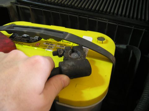 2000 Ford Excursion - Close-up of an AFE Stage II Intake & ProGuard Filter connected to a yellow battery terminal.