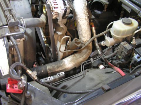 2000 Ford Excursion - Close-up view of the engine bay, highlighting the AFE Stage II intake system and ProGuard filter.