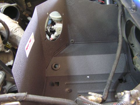 2000 Ford Excursion - Close-up of an engine bay showing an aftermarket intake system component.
