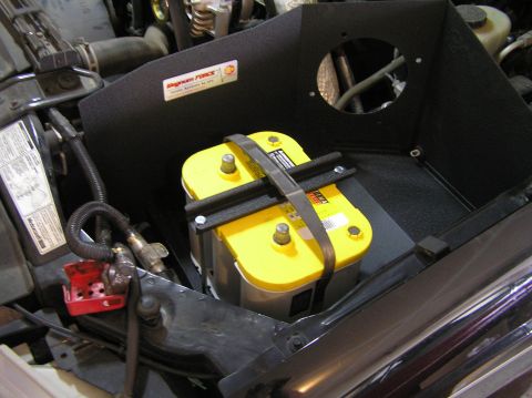 2000 Ford Excursion - Engine bay shows a yellow Optima battery and a black air intake system.