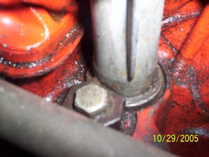1984 Ford Bronco II - A close-up view of an engine part, showing some wear and a bolt. A watermark is visible.