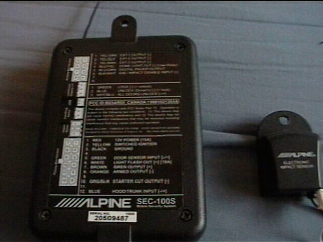 Alpine SEC-100S car alarm module with wiring diagram and electronic impact sensor