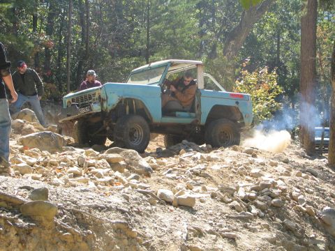 1990 Ford Bronco - He's giving it hell, but in the end snapped an outter axle shaft up front. He ended up winching up most of the rest of Daniel. Unfortunatel…