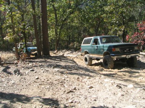 1990 Ford Bronco - The winch was pretty slow under load, so I helped himout with a strap for the last little part of Daniel.