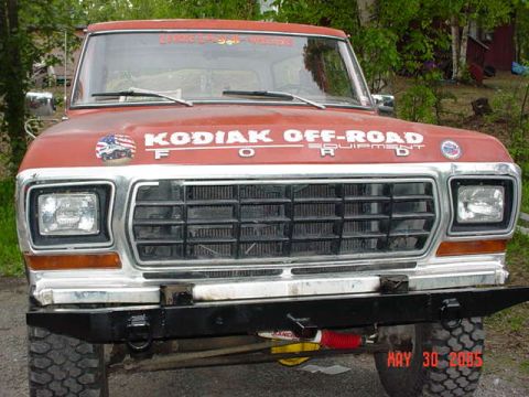 1978 Ford Bronco - This Ford truck features a prominent grille and "KODIAK OFF-ROAD EQUIPMENT" decals on its hood.