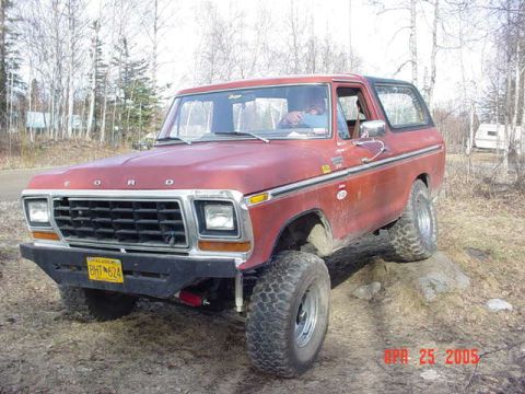 1978 Ford Bronco - This 1978 Ford Bronco is shown off-road with a driver behind the wheel.