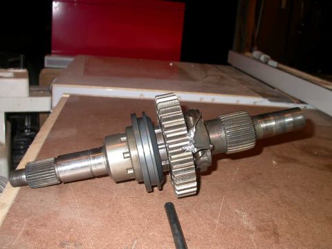 1990 Ford Bronco - Oil pump retainer bracket bent into drive sprocket, caused by oil pump siezing to output shaft