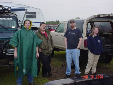 1978 Ford Bronco - A group of people stand with several vehicles and a trailer at an outdoor event, with a date stamp of "JUN 10 2005" visible.