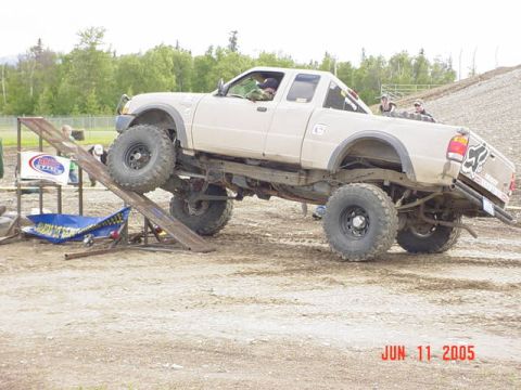 1978 Ford Bronco - A modified Ford Ranger pickup truck navigates an obstacle course, as indicated by the date stamp 'JUN 11 2005'.