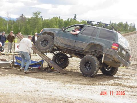 1978 Ford Bronco - A modified Jeep Grand Cherokee navigates an obstacle course during an event in June 2005.