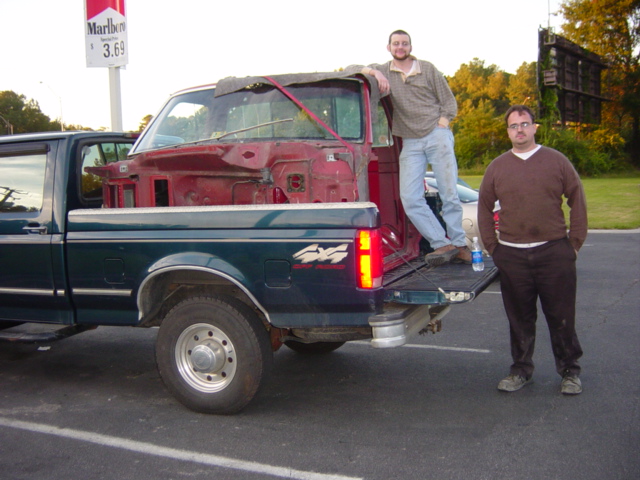 Once upon a time people posed for pictures with the things they were building.  This one, on the other hand, reminds me a little more of two guys posing next to the rhino they just killed.  All we need are large bore rifles.  Or spears.

Fit like a glove -- we even had room to close the tailgate.