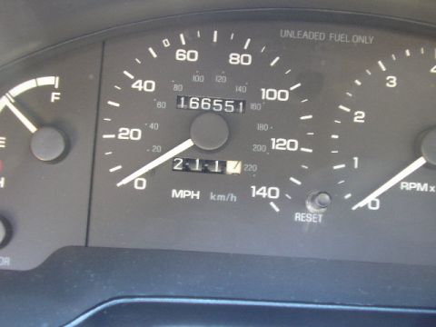1994 Ford Probe - Close-up of a car's dashboard gauges, including the speedometer and odometer.