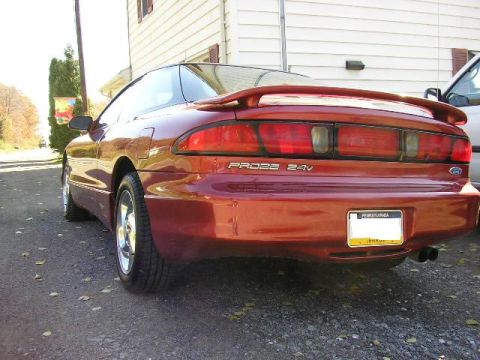 1994 Ford Probe - Rear view of a red Ford Probe, identified by its 'PROBE 24V' badging and a Pennsylvania license plate.