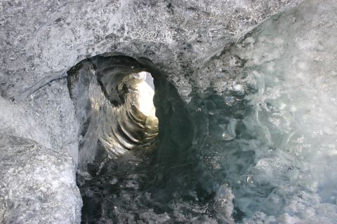 2003 Jeep TJ - The natural light illuminates the swirling ice formations within an ice cave.