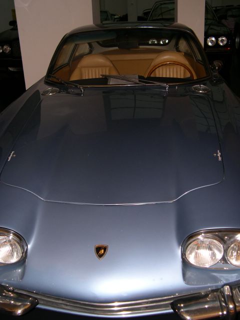2003 Jeep TJ - Front view of a classic blue Lamborghini Miura sports car.