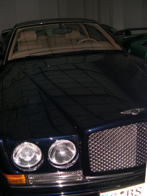 2003 Jeep TJ - The distinctive grille and dual headlights of a Bentley Azure are shown in this front-facing photograph.