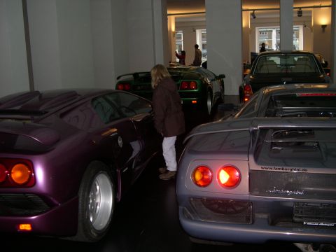 2003 Jeep TJ - Rear view of a purple Lamborghini Diablo, with a silver Lamborghini Diablo visible.