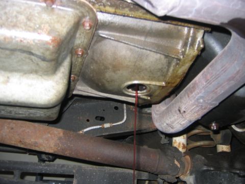 1995 Ford Bronco - It holds about 4 quarts and it takes a long time for all of it to drain, so have a beer.