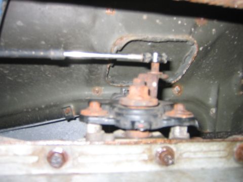 1995 Ford Bronco - Now just gently pull the kick down rod off the linkage, no need to un-bolt anything.