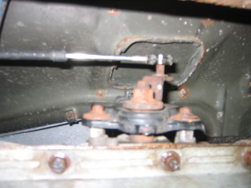 Now just gently pull the kick down rod off the linkage, no need to un-bolt anything.