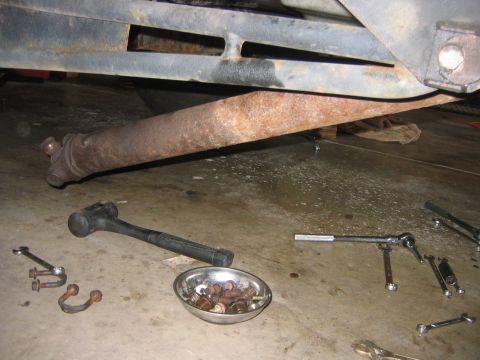 1995 Ford Bronco - Next disconnect the front drive shaft. Make sure to be careful with the bearing caps if you are reusing the U-joints, I wasn’t so I didn’t…