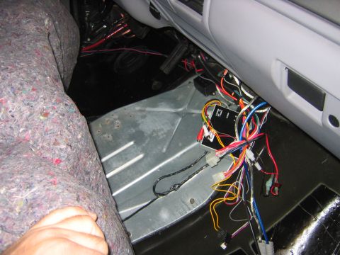 1995 Ford Bronco - Next peel back your carpet, if you have it to get access to the tranny access panel. Yours prolly wont have the wiring mess mine does, whic…