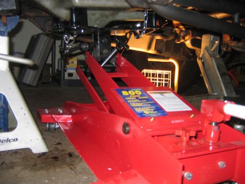 1995 Ford Bronco - At this point I knew I needed to remove the tranny. All my friends are loosers and refused to help me so I bought this $200.00 friend, it e…