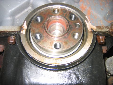 1995 Ford Bronco - It comes with a little cup thing and you place it over the sleeve and the crank and hammer it on. The cup fits on that little lip of the sl…
