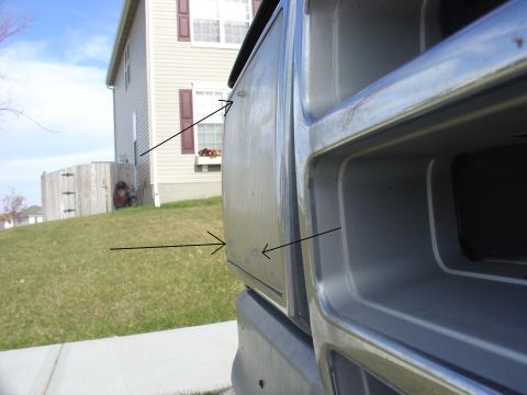 1988 Ford Bronco - A close-up view of a vehicle's front end, focusing on the grille and fender area.