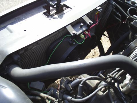 1993 Ford Crown Victoria - Close-up view of the engine bay, focusing on the radiator and fan assembly.