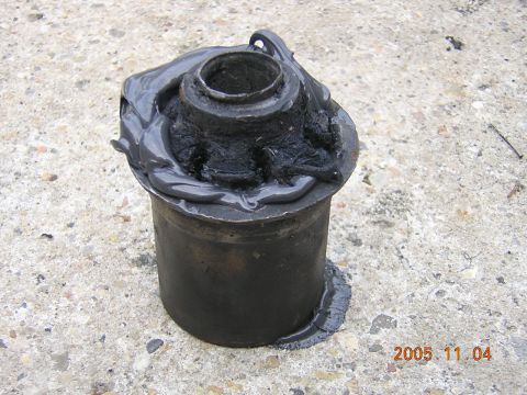 1992 Toyota Hilux - goop on the rtv generously and fill the inside as well, you do not want any air gaps where the bushing would work itself loose again