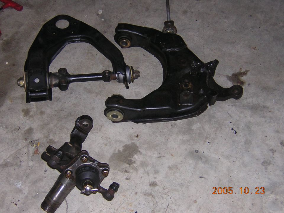 i was very careful with my overspray and placed grade 8 washers while the RTV was still setting to give it a clean look, taped off teh bushings and add a few more coats of paint, the end result looks great