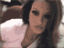 1989 Ford Bronco - A woman is pictured in this close-up photo, with her face and upper body visible.