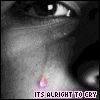 1989 Ford Bronco - A close-up image of a person's face, with a tear rolling down their cheek, accompanied by the text 'ITS ALRIGHT TO CRY'.