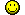 1989 Ford Bronco - A yellow smiley face sticker is visible against a dark background.