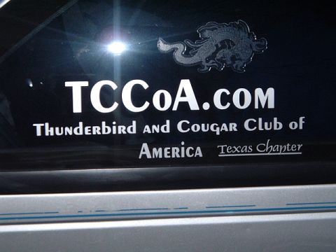 1992 Ford Thunderbird - A sticker on a car window advertises the Thunderbird and Cougar Club of America, Texas Chapter.