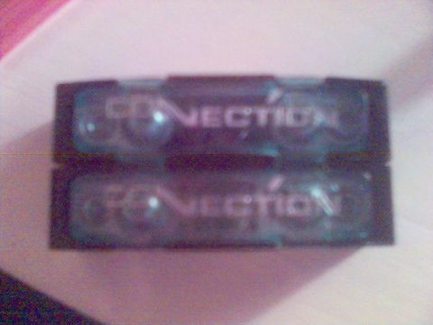 1994 Ford Probe - Two car audio amplifiers are shown, each with the word "CONNECTION" visible on its casing.