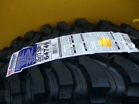 1996 Ford Bronco - BFGoodrich Mud-Terrain T/A tires, size 35x12.50R15, with product information labels.
