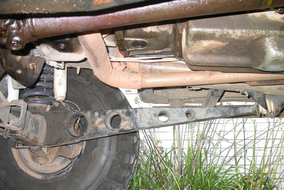 Extended Radius Arms!  These things are beefy as hell.  They are old Superlift arms, I don't know if they're still selling them or not.