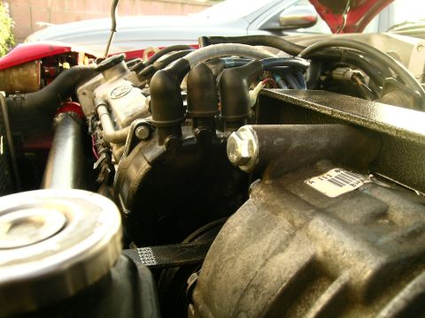 1993 Ford Probe - Engine bay detail with spark plug wires and various engine parts visible.