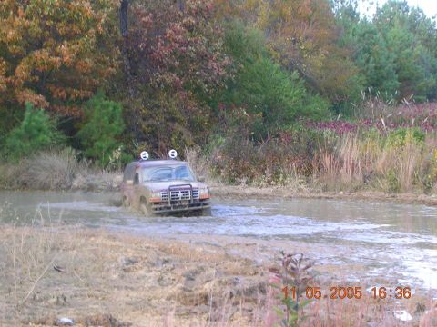 1989 Ford Bronco II - This 1989 Ford Bronco II is navigating a challenging muddy terrain.