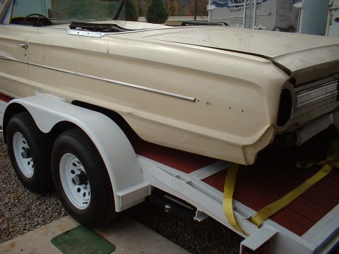 1964 Ford Galaxie - This 1963 Ford Thunderbird convertible is being transported on a trailer.