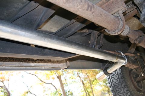 1993 Ford F-350 - Underneath the truck. 3" ATS downpipe upgrade, then straight pipe, no muffler to a 60 degree bend out in front of the rear passenger tire.…
